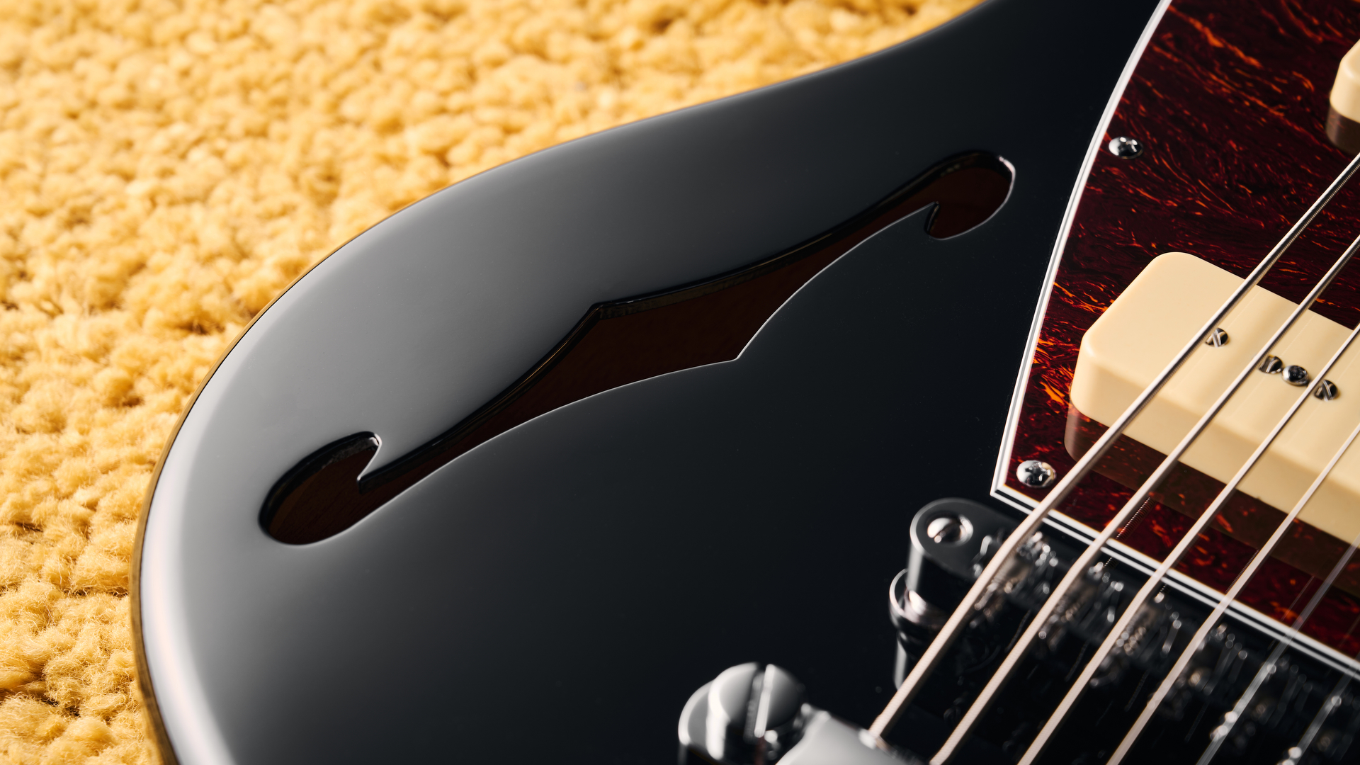 The F-hole on an Orangewood Del Sol Baritone guitar