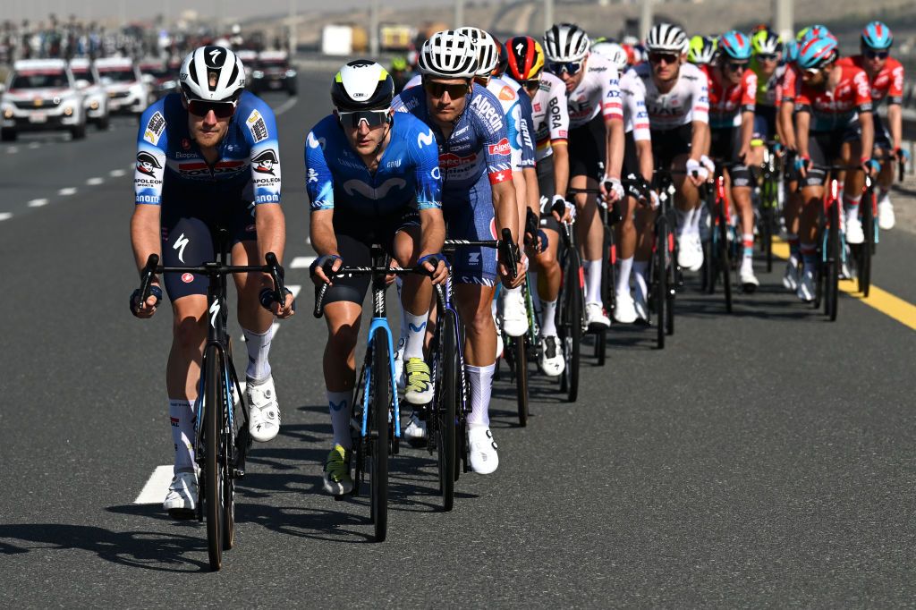 DUBAI HARBOUR DUBAI UNITED ARAB EMIRATES FEBRUARY 22 LR Avco Bastiaens of Belgium and Team SoudalQuick Step Pelayo Sanchez of Spain and Team Movistar and Silvan Dillier of Switzerland and Team AlpecinDeceuninck lead the peloton during the 6th UAE Tour 2024 Stage 4 a 168km stage from Dubai Police Officers Club to Dubai Harbour UCIWT on February 22 2024 in Dubai United Arab Emirates Photo by Tim de WaeleGetty Images