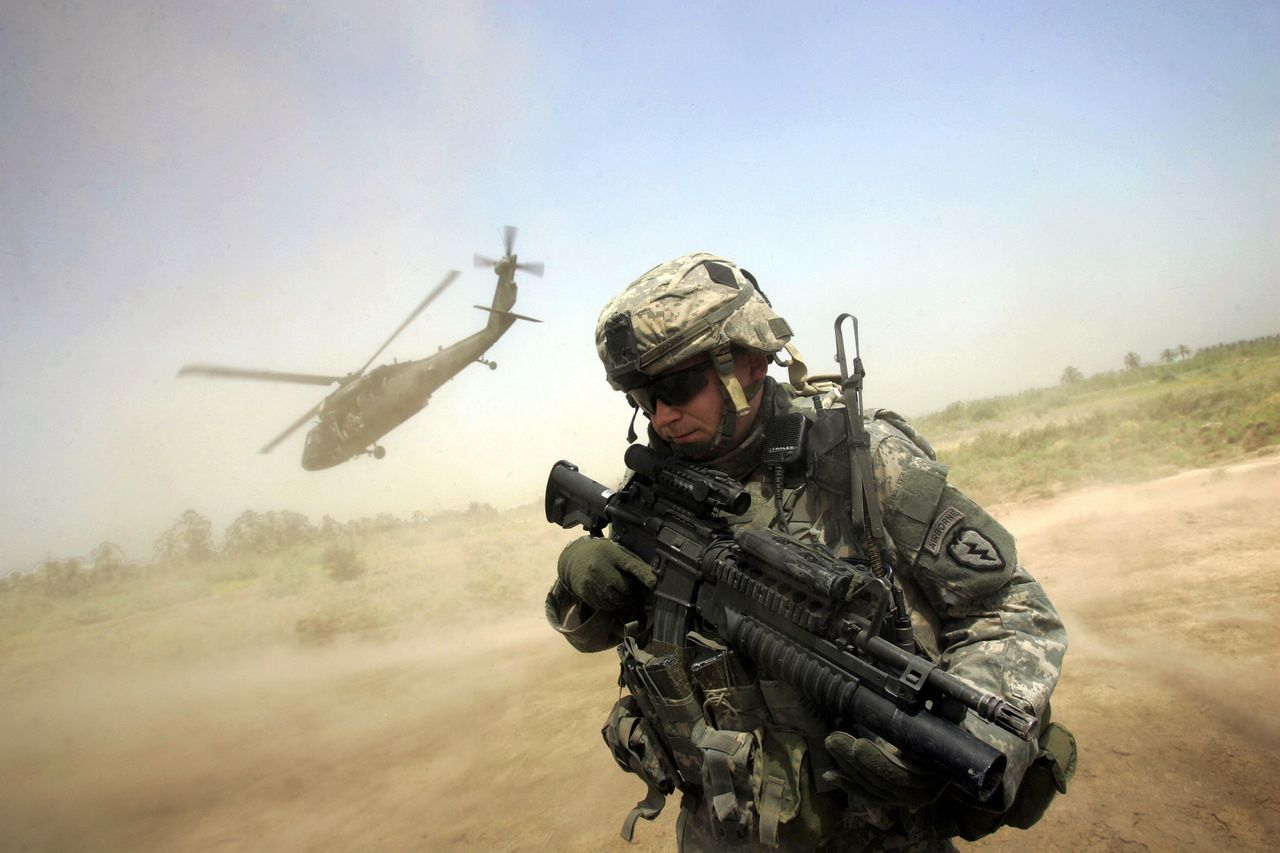 A U.S. solder beneath a helicopter