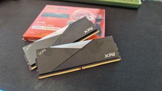 XPG Lancer RGB DDR5 up close resting on its box