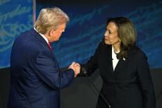 Kamala Harris shakes hands with Donald Trump during a presidential debate ahead of US elections