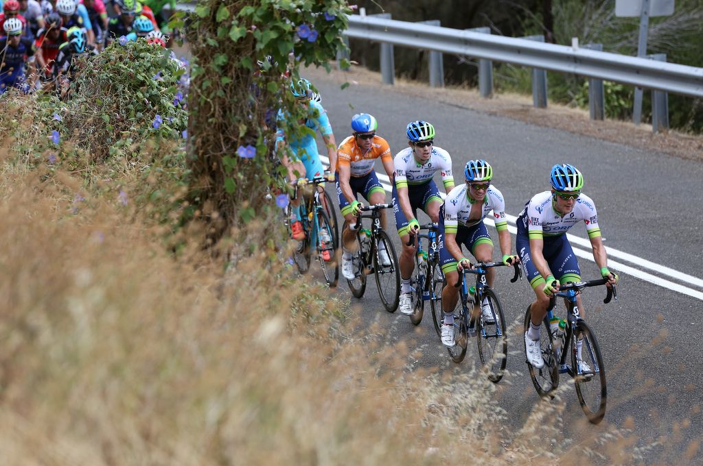 Luke Durbridge (Orica-BikeExchange) riding on the front of the peloton for teammate and race leader Simon Gerrans
