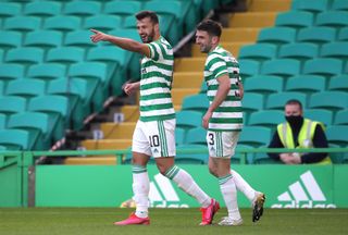 Celtic’s Albian Ajeti (left) celebrates scoring his side’s third goal