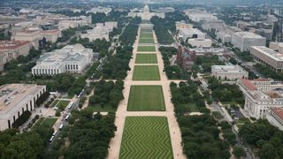 Temporary fencing is seen from the Washington Monument ahead of the Army's 250th birthday parade and celebration on the National Mall on June 09, 2025 in Washington, DC. The U.S. Army will mark its 250th anniversary with a parade along the National Mall that will include 6,500 troops, 150 vehicles and 50 aircraft.