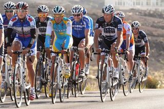 Bjarne Riis checks out Alberto's Contador's form during a ride