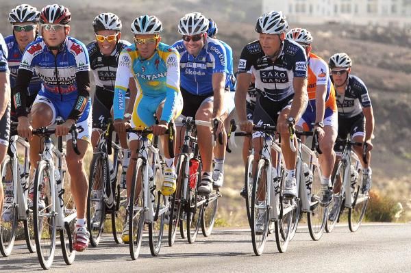 Bjarne Riis checks out Alberto's Contador's form during a ride