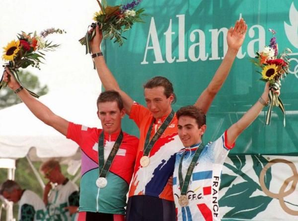 1996 Olympic mountain bike race men's podium: Thomas Frischknecht (Switzerland), Bart Brentjens (Netherlands), Miguel Martinez (France)