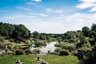 A landscape with lake at The Tawny Hotel creating a good habitat for wildlife