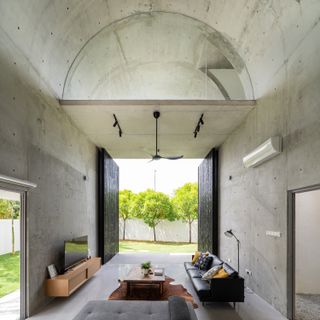 Bewboc house in Malaysia within the concrete extension looking out