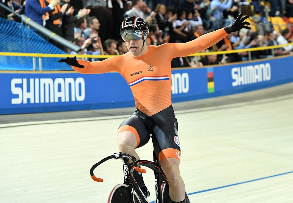 Netherland's Harrie Lavreysen celebrates after victory in the men's team sprint final race at The UCI World Cycling Championships
