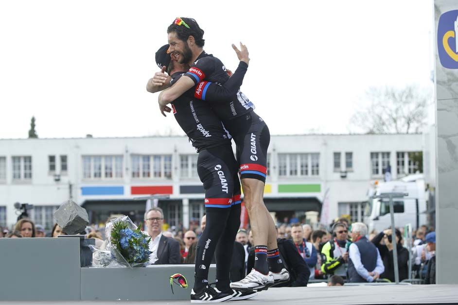 Roy Curvers celerates with John Degenkolb after the latter won Paris-Roubaix