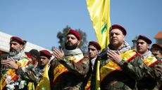 Hezbollah militants attend a funeral in Lebanon's southern village of Adaysseh, 5 March 2024