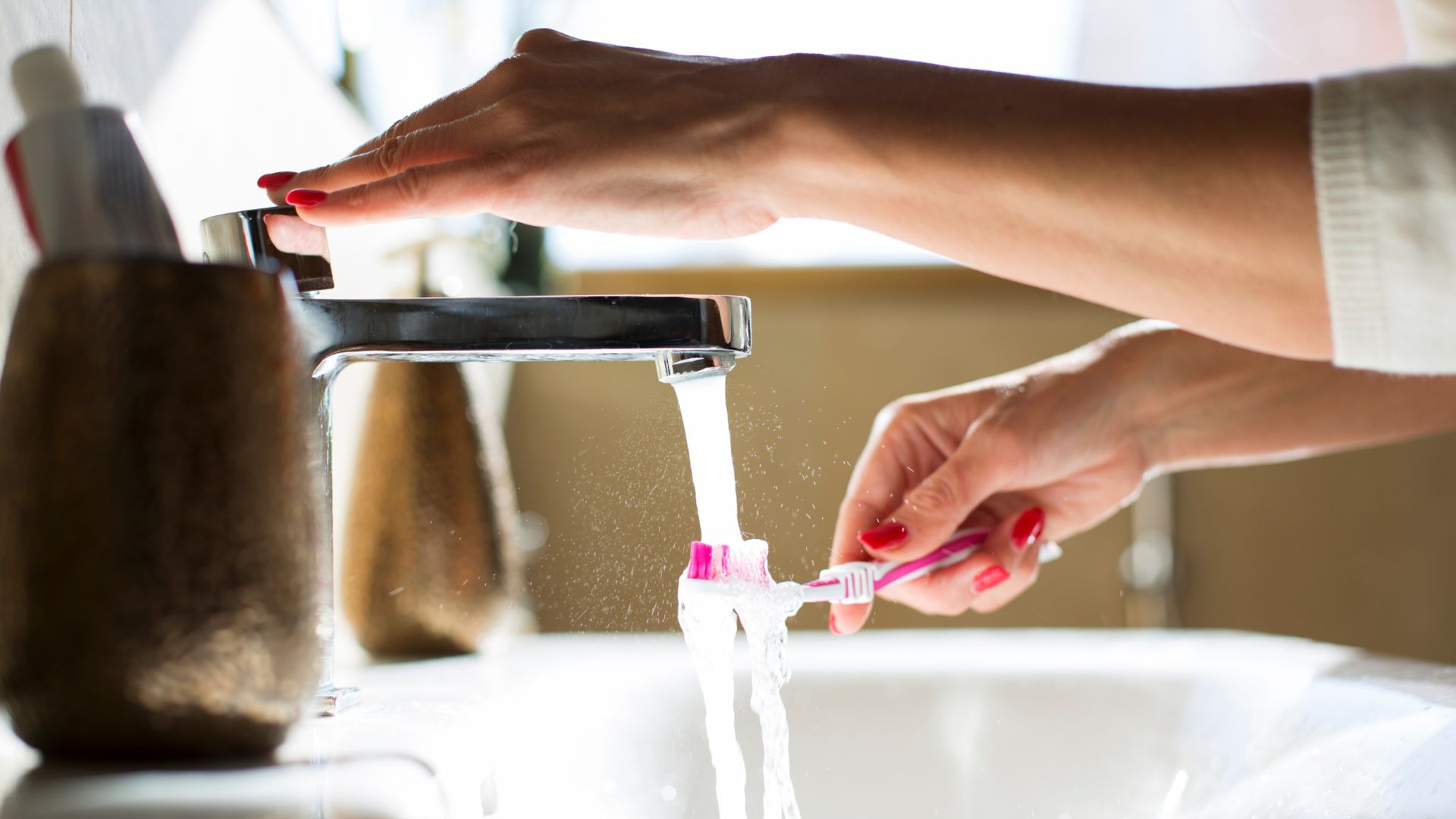 Woman brushing her teeth