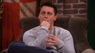 Joey (Matt LeBlanc) mimes licking peanut butter off of his fingers.