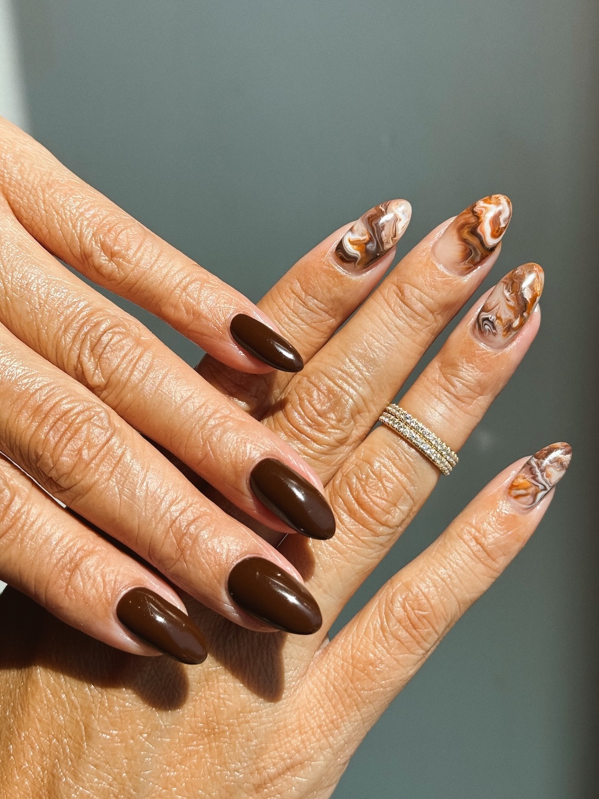 Brown milky nail design
