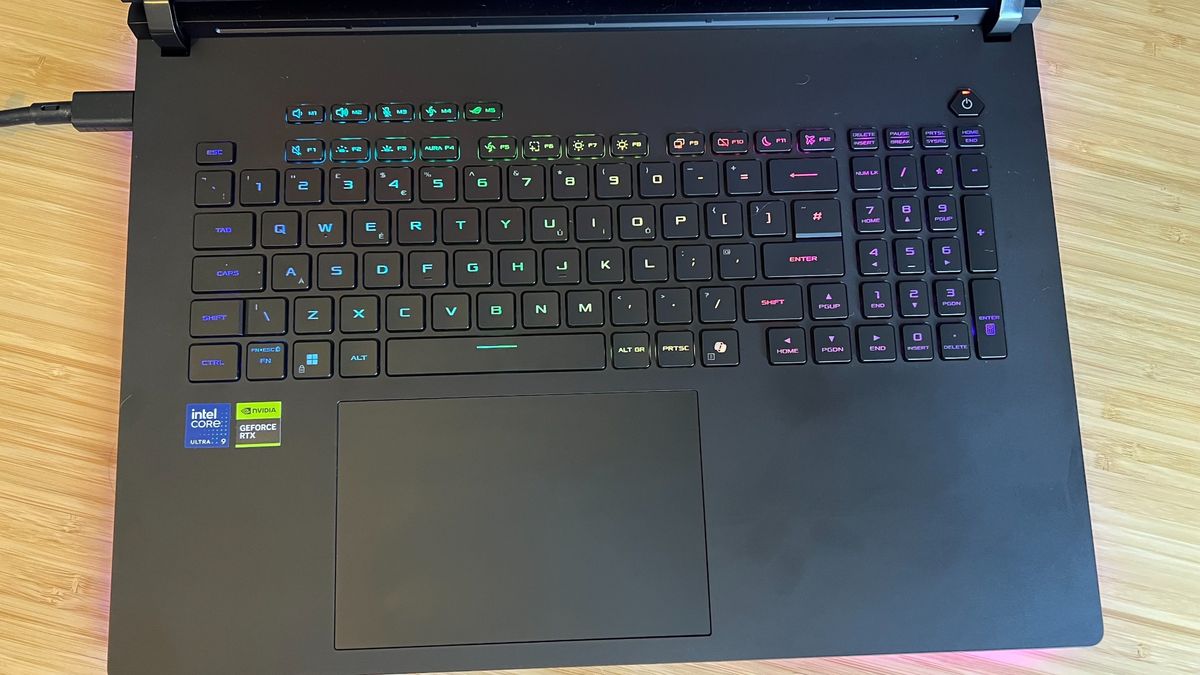 Top down view of Asus ROG Strix Scar 18 gaming laptop keyboard and trackpad