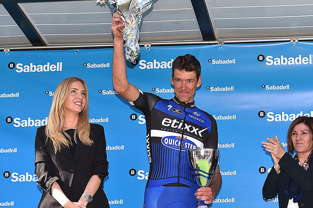 Stijn Vandenbergh (Etixx-QuickStep) on the podium as the finale stage winner