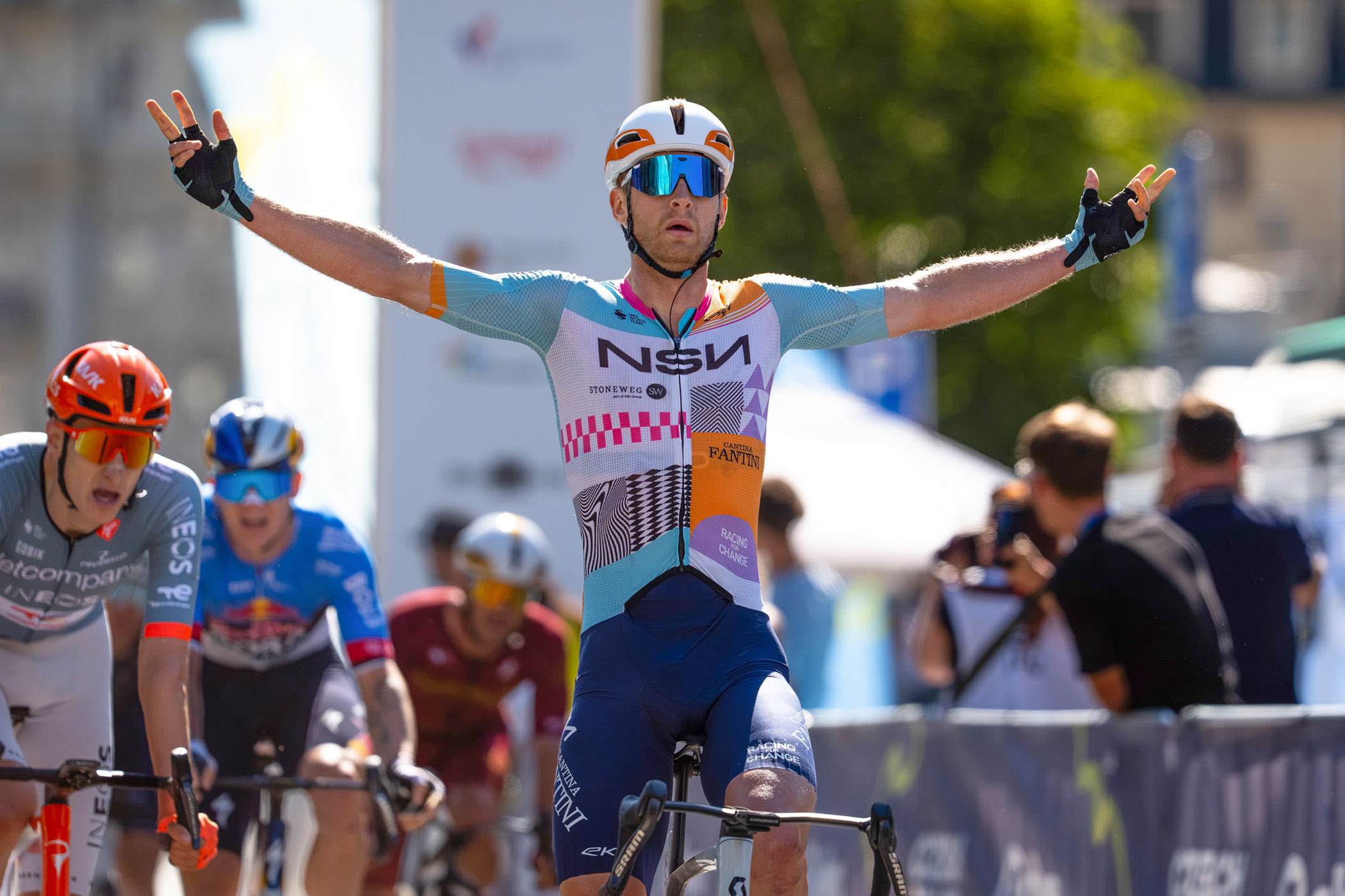 Riley Sheehan celebrates victory on stage 1 of the 2026 Czech Tour