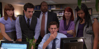 the office stars looking at computer