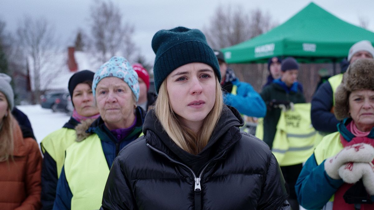 Hanna Ahlander (Carla Sehn) stands in a crowd in Netflix&#039;s &quot;The Åre Murders&quot;