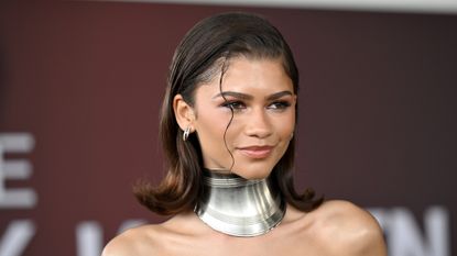 Zendaya on the Essence red carpet in a silver cuff necklace