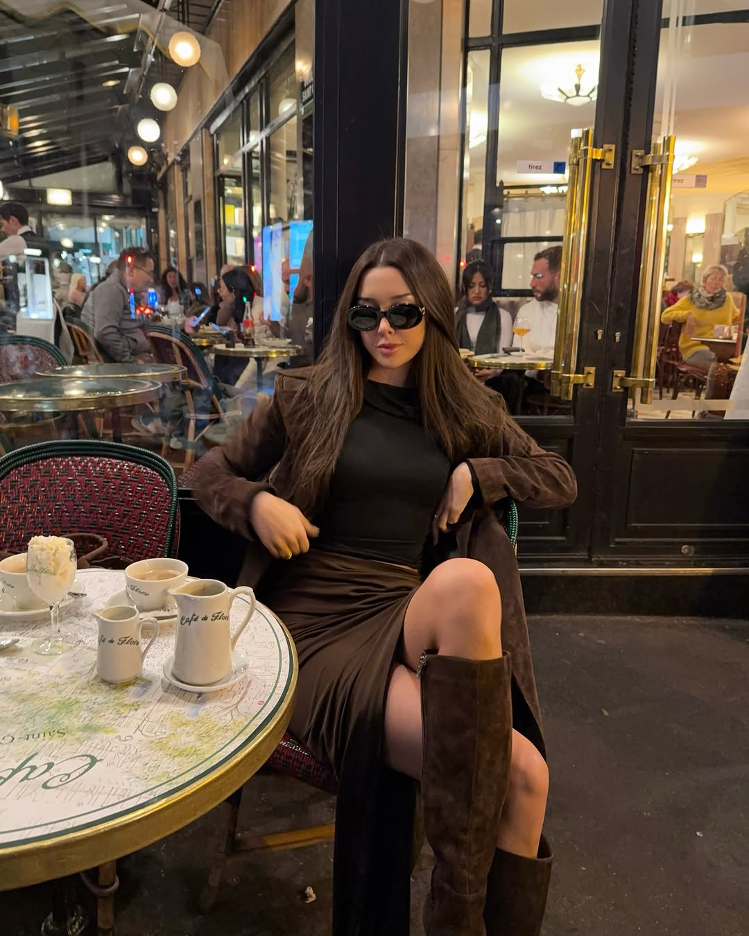 woman wearing knee high brown suede boot trend