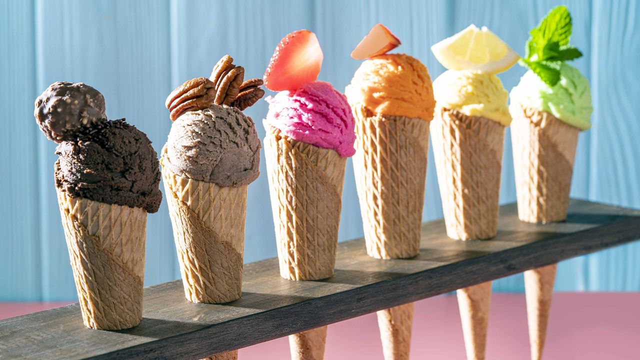 Different flavors of ice cream on waffle cones