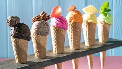 Different flavors of ice cream on waffle cones