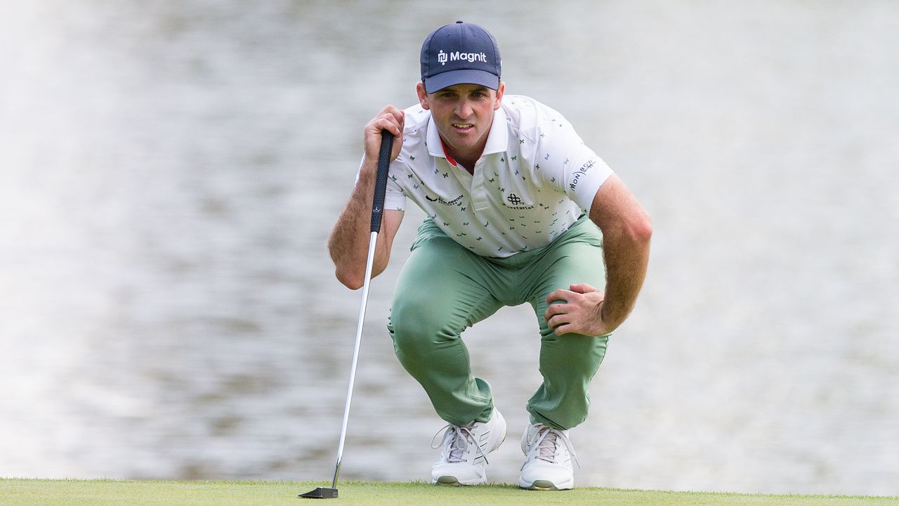 Denny McCarthy studies his putt on the 16th green during the Travelers Championship.