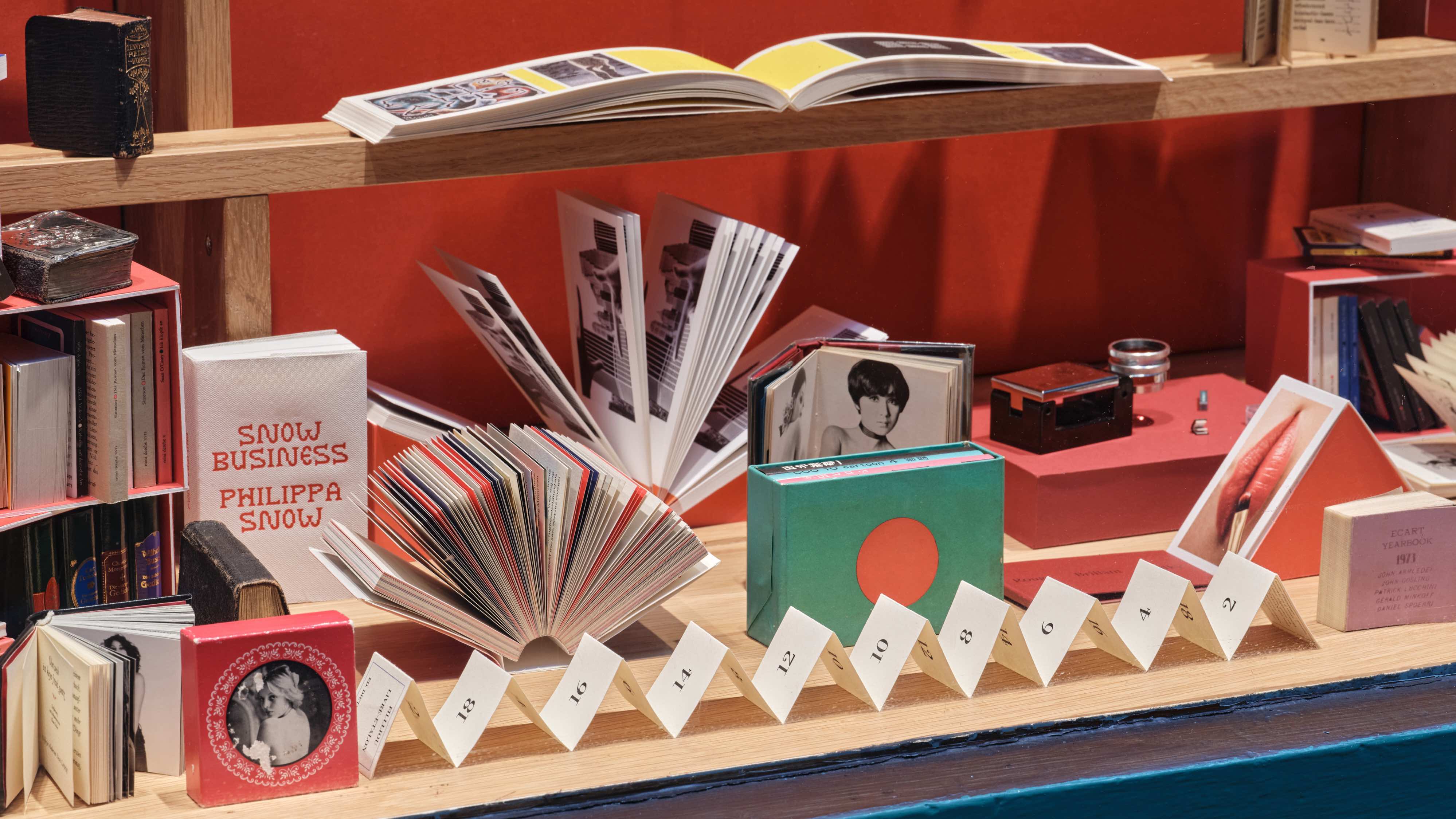 books arranged across exhibition space