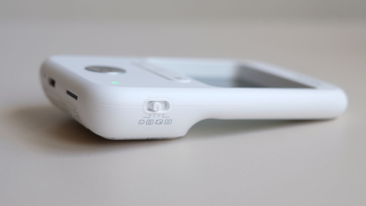 Photograph of the Godox C100 compact camera with transparent screen / viewfinder