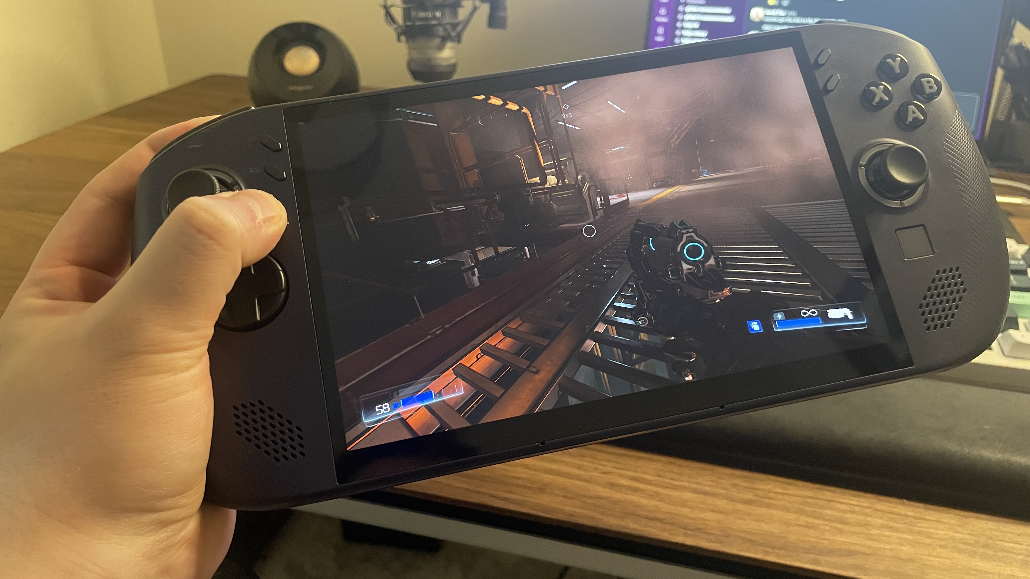 A Lenovo Legion Go S handheld with SteamOS in Nebula Nocturne colour scheme