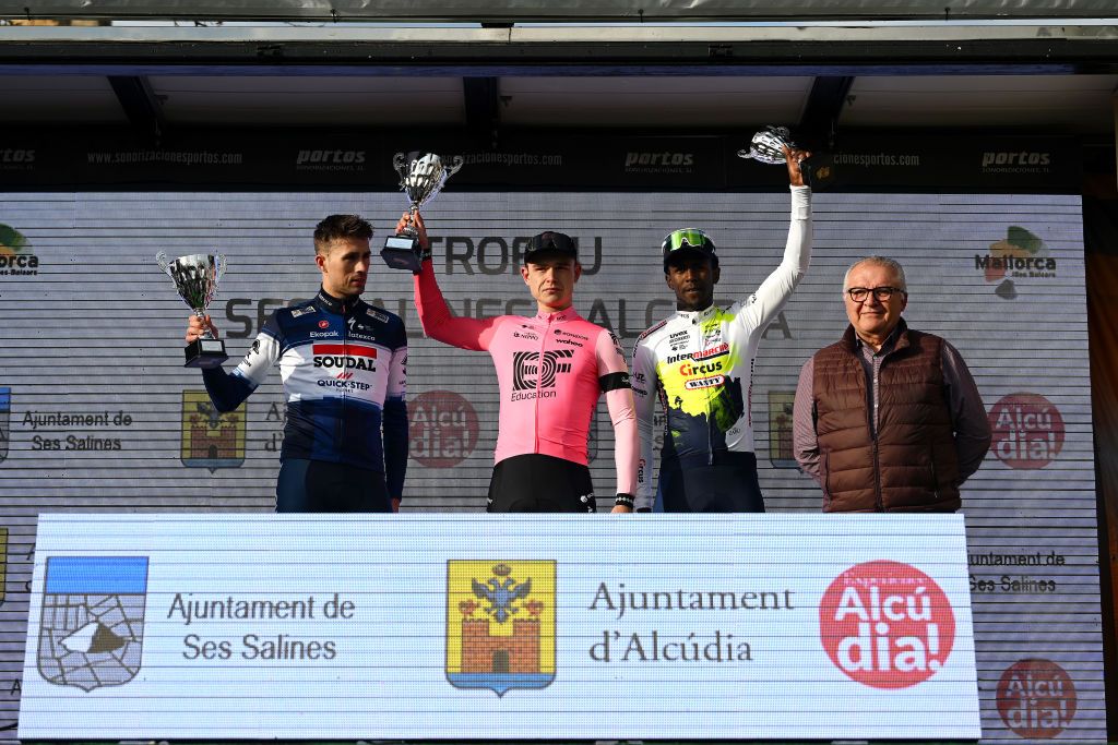 ALCUDIA SPAIN JANUARY 26 LR Ethan Vernon of The United Kingdom and Team SoudalQuick Step on second place race winner Marijn van den Berg of The Netherlands and Team EFEasyPost and Biniam Girmay of Eritrea and Team IntermarcheCircus on third place pose on the podium ceremony after the 32nd Challenge Ciclista Mallorca 2023 Trofeo Ses Salines Alcdia a 1586km one day race from Ses Salines to Por DAlcdia ChallengeMallorca on January 26 2023 in Alcudia Spain Photo by Dario BelingheriGetty Images