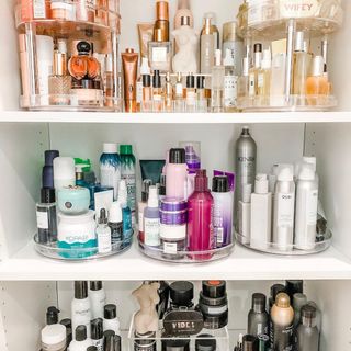 Colorful makeup and toiletries on shelves