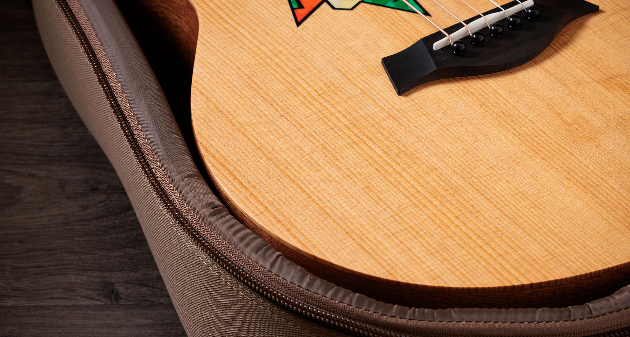 Taylor Jacob Collier GS Mini: featuring a brightly-coloured rosette graphic designed with the musical polymath, this beginner friendly acoustic has a bold five-string design for his signature DAEAD tuning.