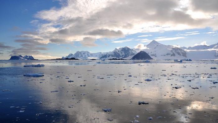 The mountainous and icy coastline of the Antarctic Peninsula