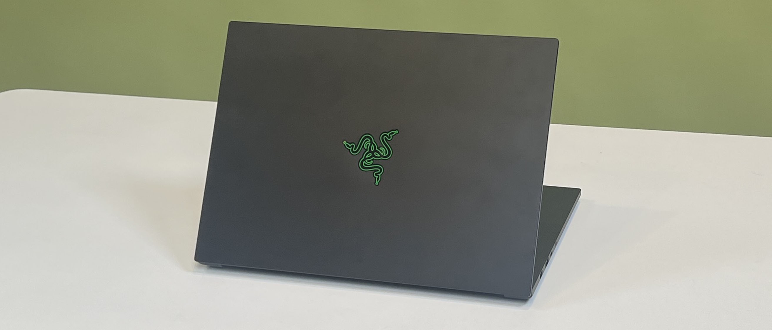 A Razer Blade 14 (2025) on a desk with its lid facing the viewer