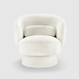 Swivel boucle accent chair.