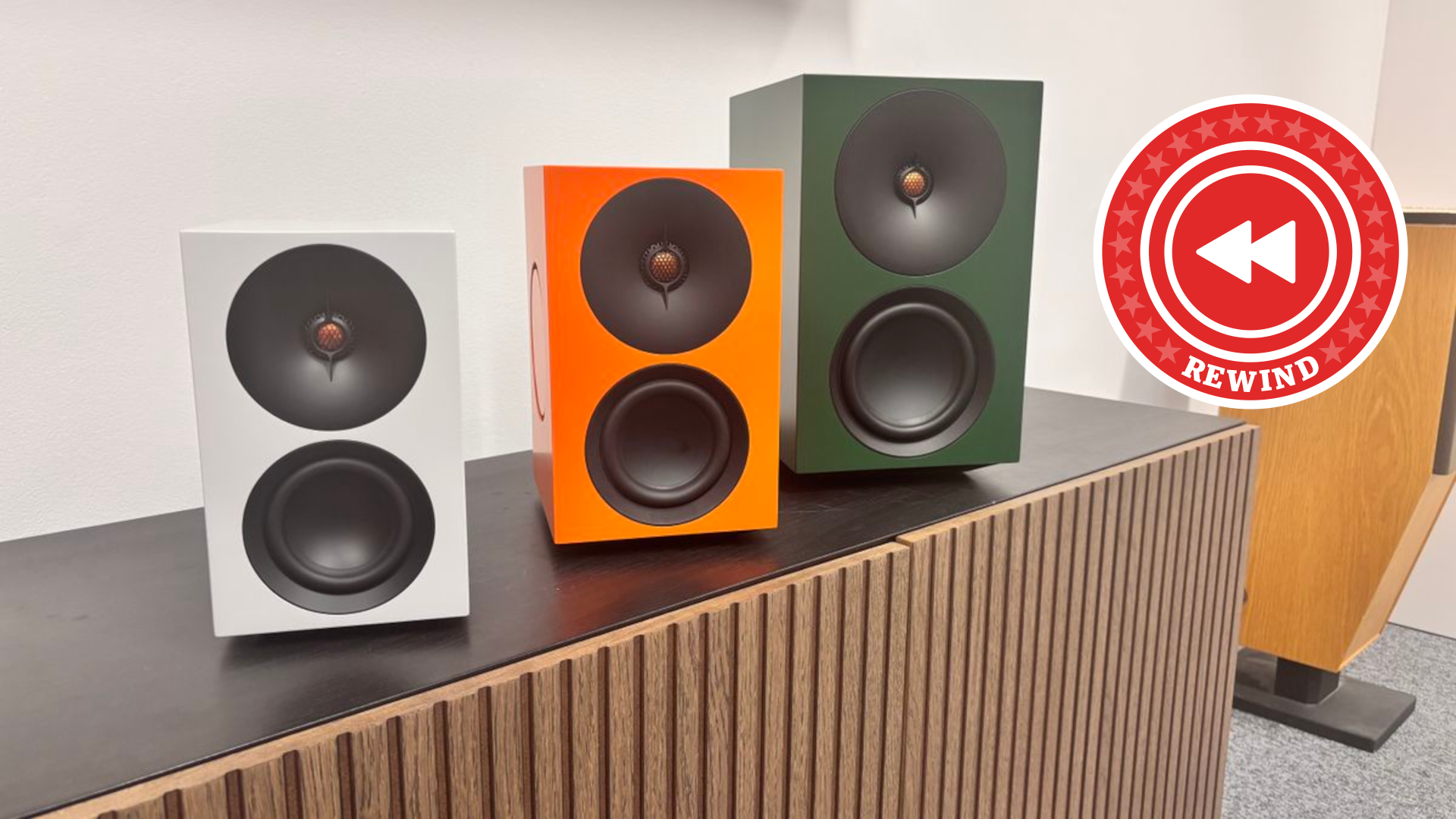 Cambridge Audio speakers on table next to rewind logo