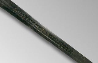 A close up of the sword's mysterious inscription.