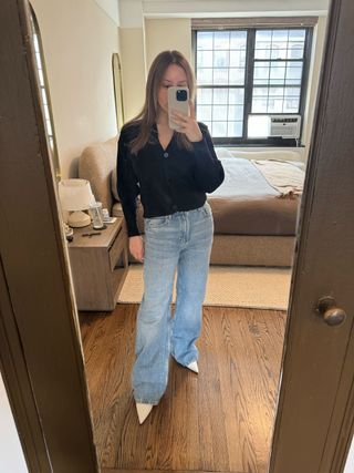 Nikki wears wide-leg jeans from H&M.