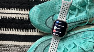Apple Watch running apps on top of nike sneakers