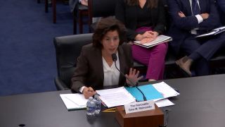 US Commerce Secretary Gina Raimondo speaking at a hearing in the US house