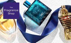 The Fragrance Shop Logo placed over a versace perfume with a blue ribbon weaving in and around