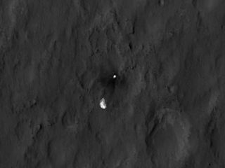 The parachute and backshell of NASA's Mars rover Curiosity are seen in this photo from the Mars Reconnaissance Orbiter released on Aug. 7, 2012. Curiosity landed on Mars on Aug. 5 PDT.