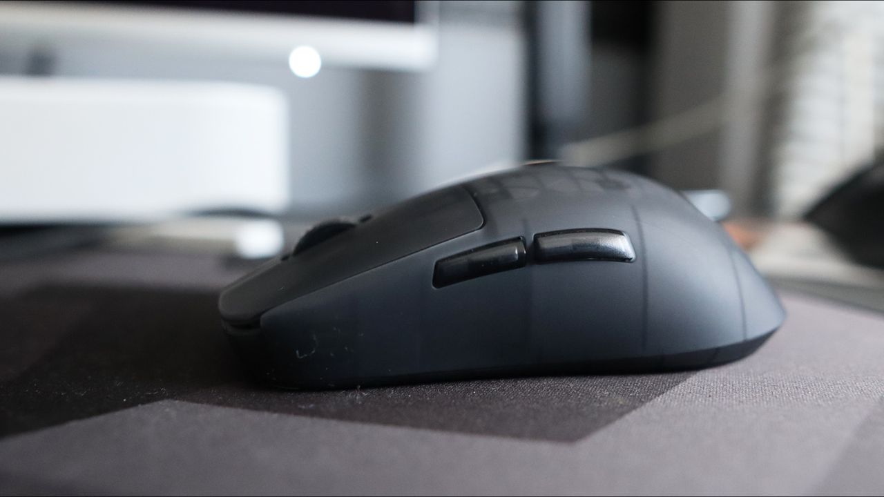 An Endgame Gear OP1w 4K gaming mouse on a desk.