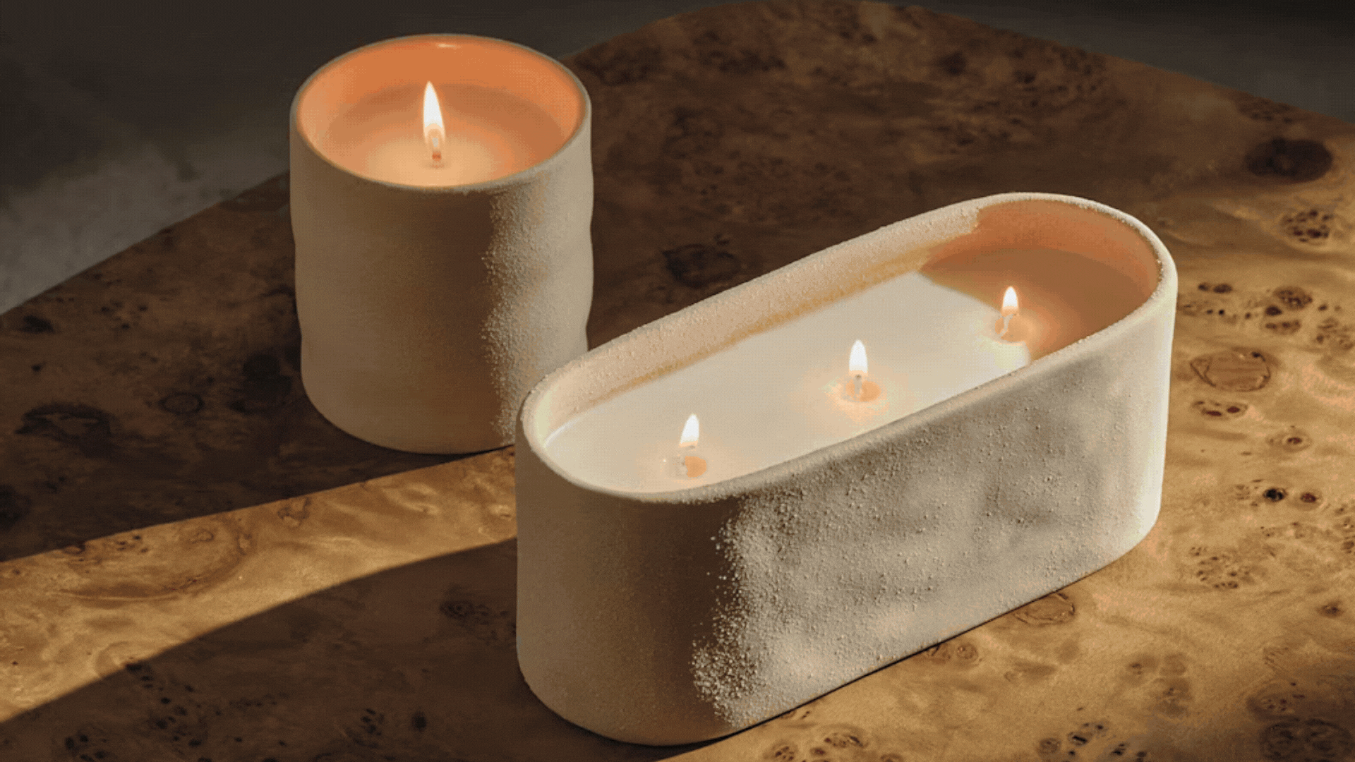 A GIF of scented candles and a room spray from M&S