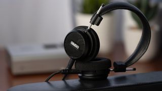 Grado Signature Series S150 headphones on a black table