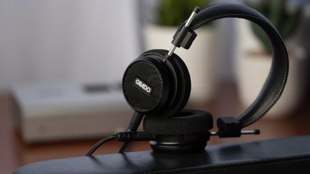 Grado Signature Series S150 headphones on a black table