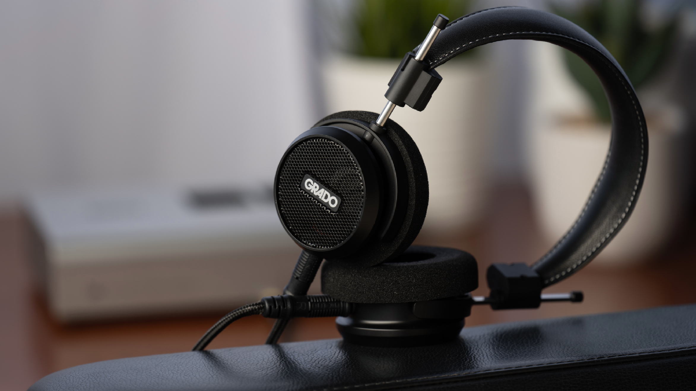 Grado Signature Series S150 headphones on a black table